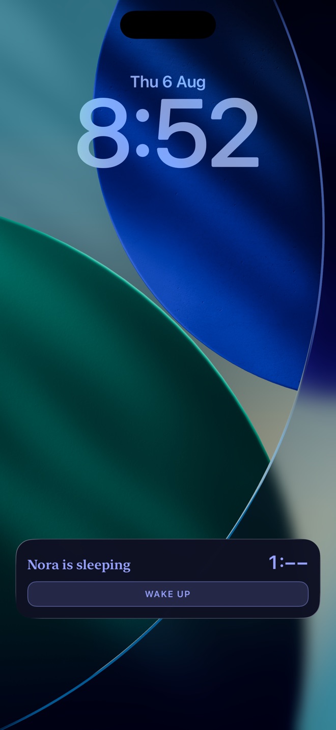 The iPhone lock screen during a night, with one-tap feed and awake buttons